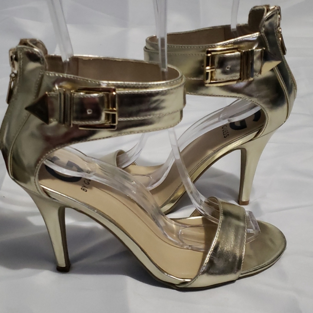 Guess gold Metallic strappy sandlas.